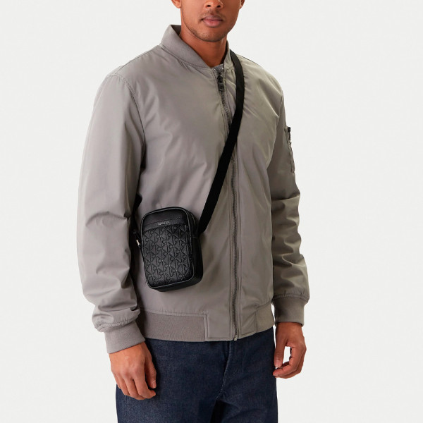 emblem-slim-reporter-crossbody-bag