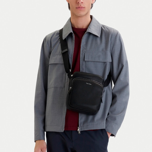 raised-pocket-reporter-crossbody-bag