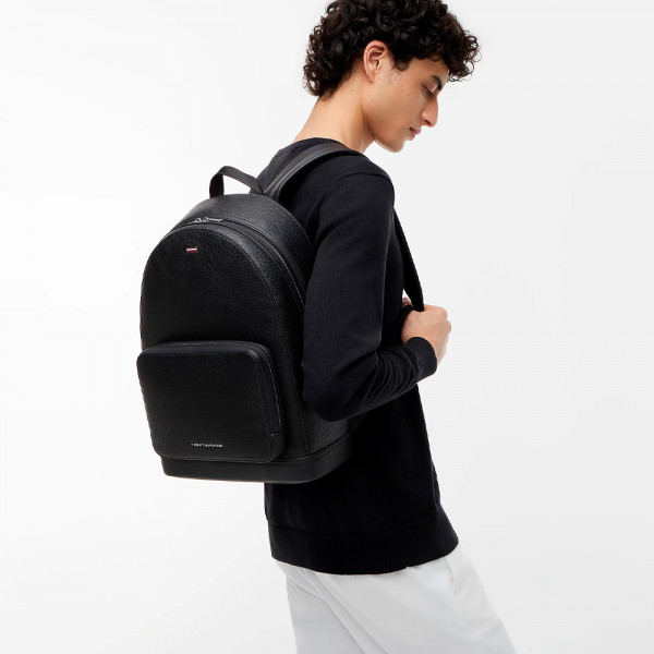 backpack-with-badge-and-distinctive-ribbon